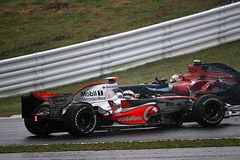 Fernando Alonso (McLaren-Mercedes), Sebastian Vettel (Toro Rosso-Ferrari)