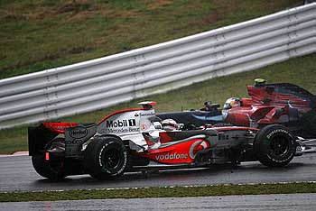 Fernando Alonso (McLaren-Mercedes), Sebastian Vettel (Toro Rosso-Ferrari)