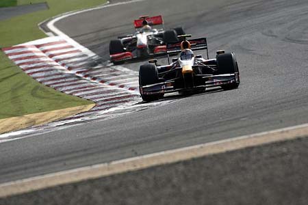 Sebastian Vettel (Red Bull-Renault), Lewis Hamilton (McLaren-Mercedes)