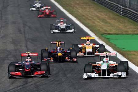 Heikki Kovalainen (McLaren-Mercedes), Vitantonio Liuzzi (Force India-Mercedes)