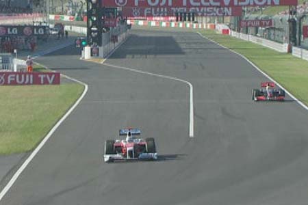 Jarno Trulli (Toyota), Lewis Hamilton (McLaren-Mercedes)