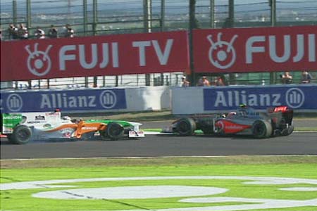 Adrian Sutil (Force India-Mercedes), Heikki Kovalainen (McLaren-Mercedes)