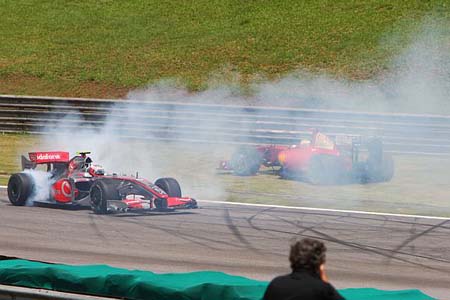 Heikki Kovalainen (McLaren-Mercedes), Giancarlo Fisichella (Ferrari)